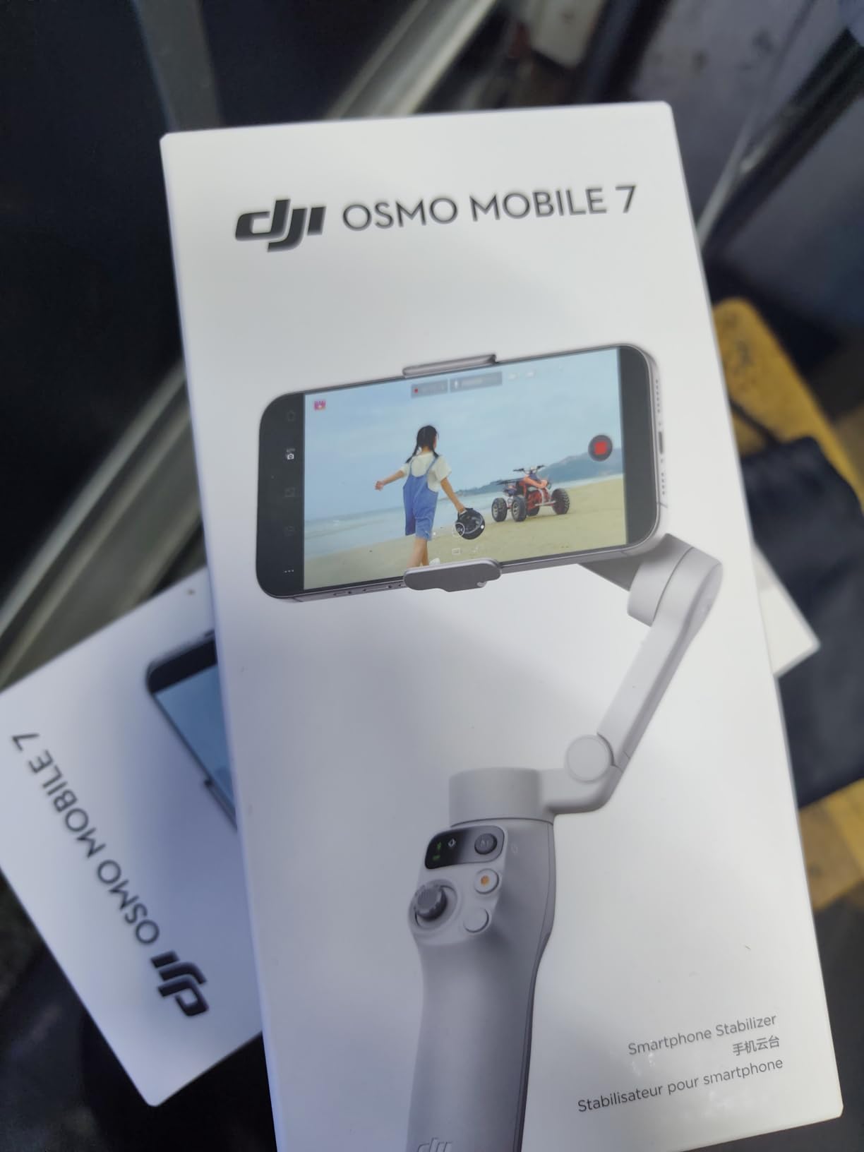 DJI Osmo Mobile 7 Gimbal Stabilizer for iPhone & Android, 3-Axis Gimbal | Built-in Tripod, Ultra-Light, Comfortable Grip, ActiveTrack, ShotGuides, One-Tap Edit, 10hrs Use, Phone Charging customer photo 1