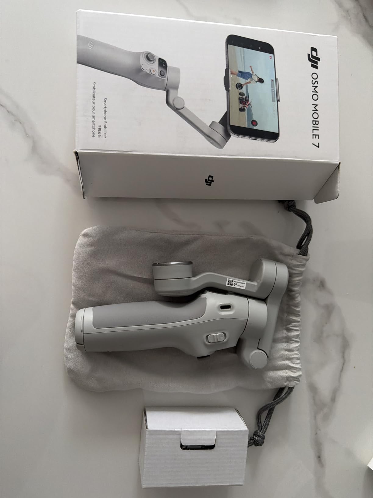DJI Osmo Mobile 7 Gimbal Stabilizer for iPhone & Android, 3-Axis Gimbal | Built-in Tripod, Ultra-Light, Comfortable Grip, ActiveTrack, ShotGuides, One-Tap Edit, 10hrs Use, Phone Charging customer photo 2