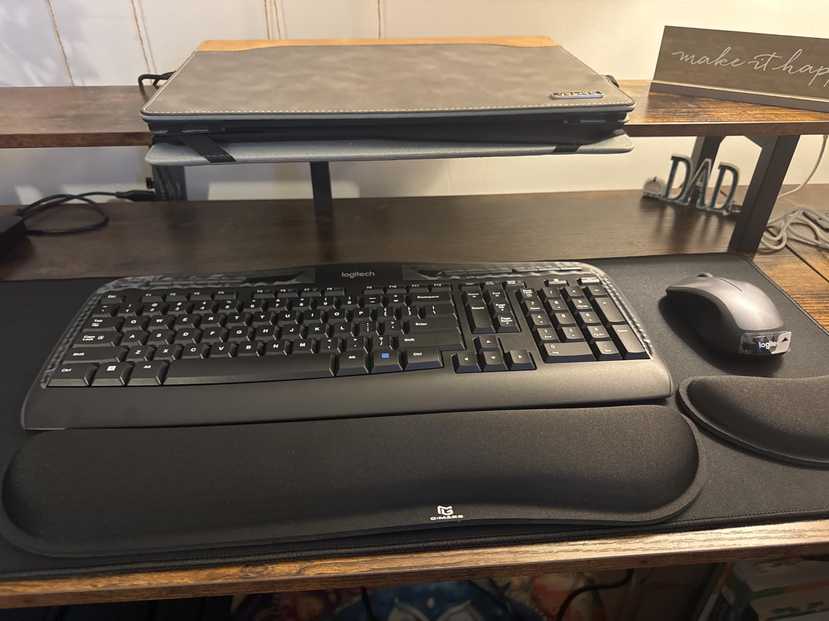 Logitech MK335 Full Size Quiet Wireless Keyboard Mouse Combo - Black/Silver | Full size low-profile quiet keyboard, full size ambidextrous contoured mouse with rubberized side grips customer photo 1