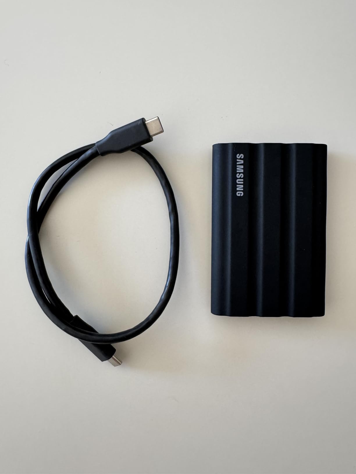 Samsung T7 Shield 2TB Portable SSD, USB 3.2 Gen2, Rugged, IP65 Rated, for Photographers, Content Creators and Gaming, External Solid State Drive (MU-PE2T0R/AM, 2022), Blue customer photo 1