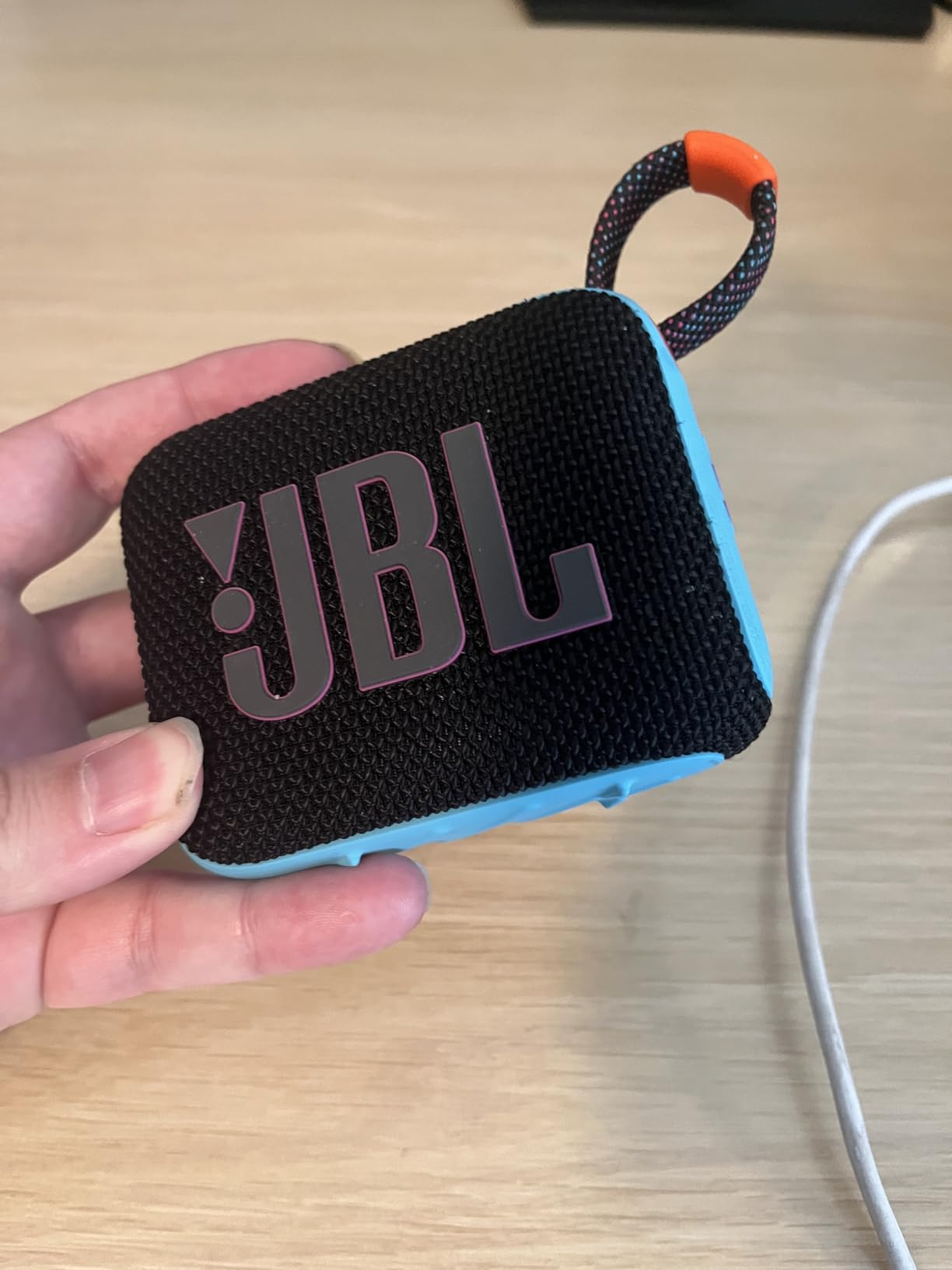 JBL Go 4 - Ultra-Portable, Waterproof and Dustproof Bluetooth Speaker, Big JBL Pro Sound with Punchy bass, 7-Hour Built-in Battery, Made in Part with Recycled Materials (Black) customer photo 1