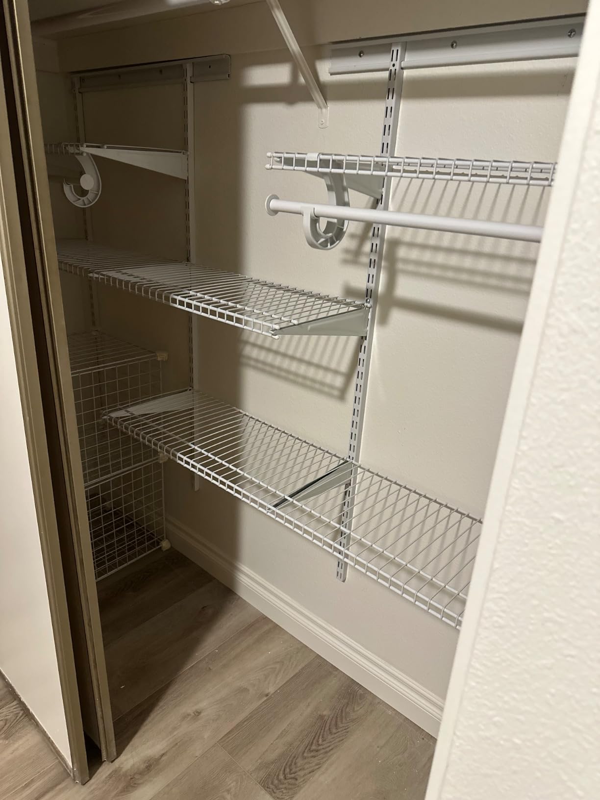 ClosetMaid ShelfTrack Wire Closet Organizer System, Adjustable from 4 to 6 Ft., With Shelves, Clothes Rods, Hardware, Durable Steel, White customer photo 1