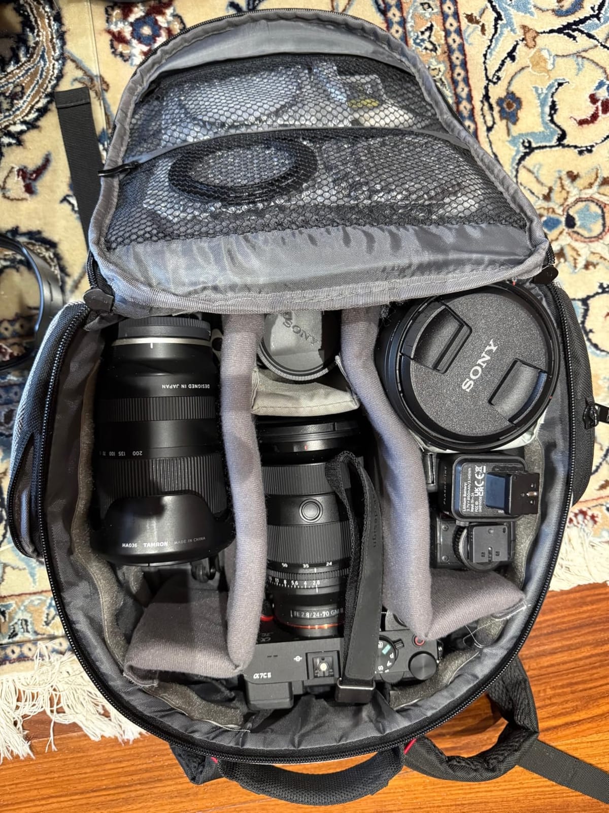 USA Gear Portable Camera Backpack for DSLR with Customizable Accessory Dividers, Weather Resistant Bottom and Comfortable Back Support - Compatible with Canon, Nikon, Sony, Fujifilm, and More (Black) customer photo 1