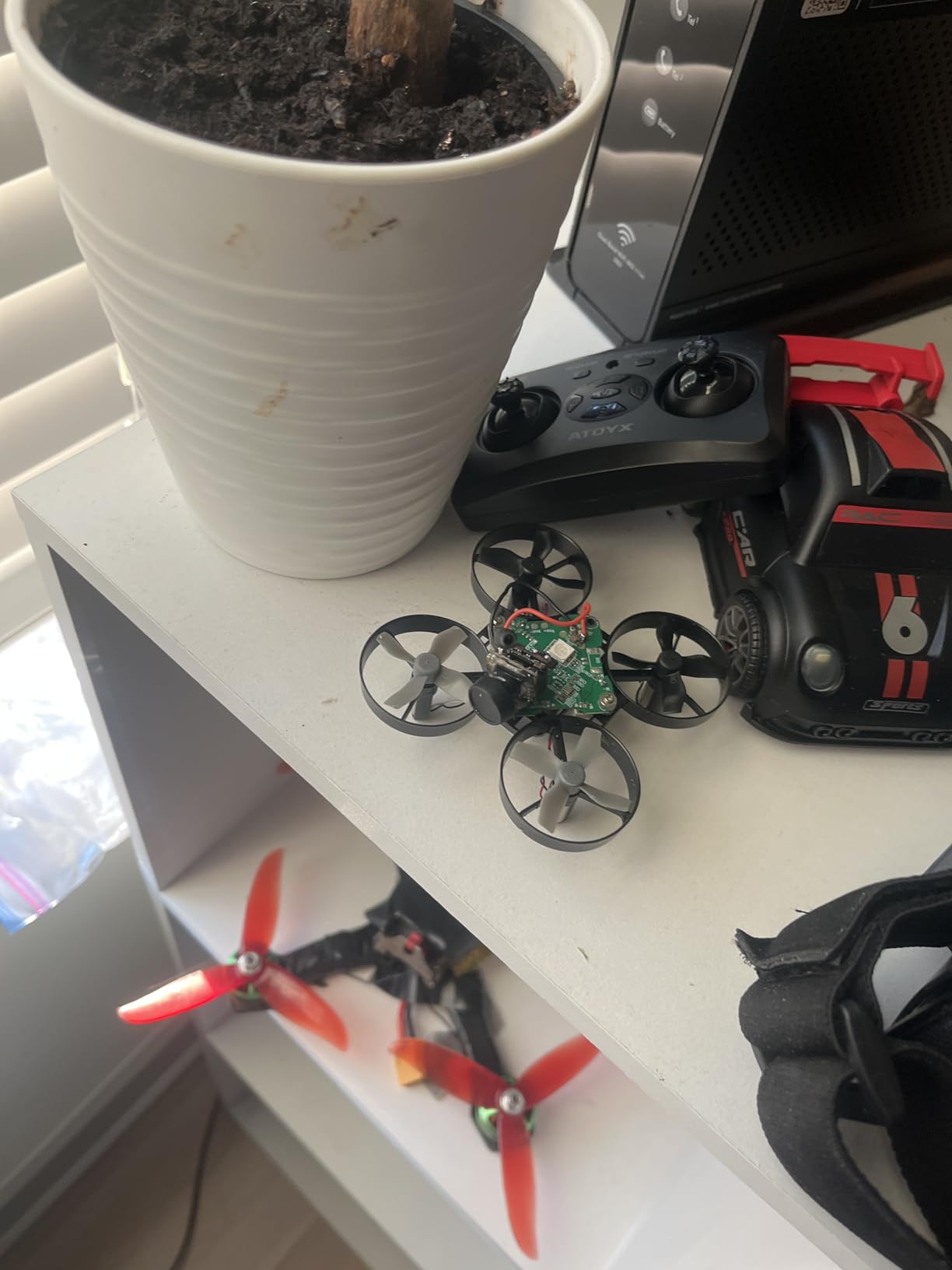 Mini Drone for Kids & Beginners, Indoor RC Nano Helicopter Quadcopter with Auto Hovering,3D Flips,Portable Hand Operated, Birthday& Children's Day Gift for Boys and Girls,Headless Mode & Remote Control,Blue.4-blade design-ATOYX customer photo 2