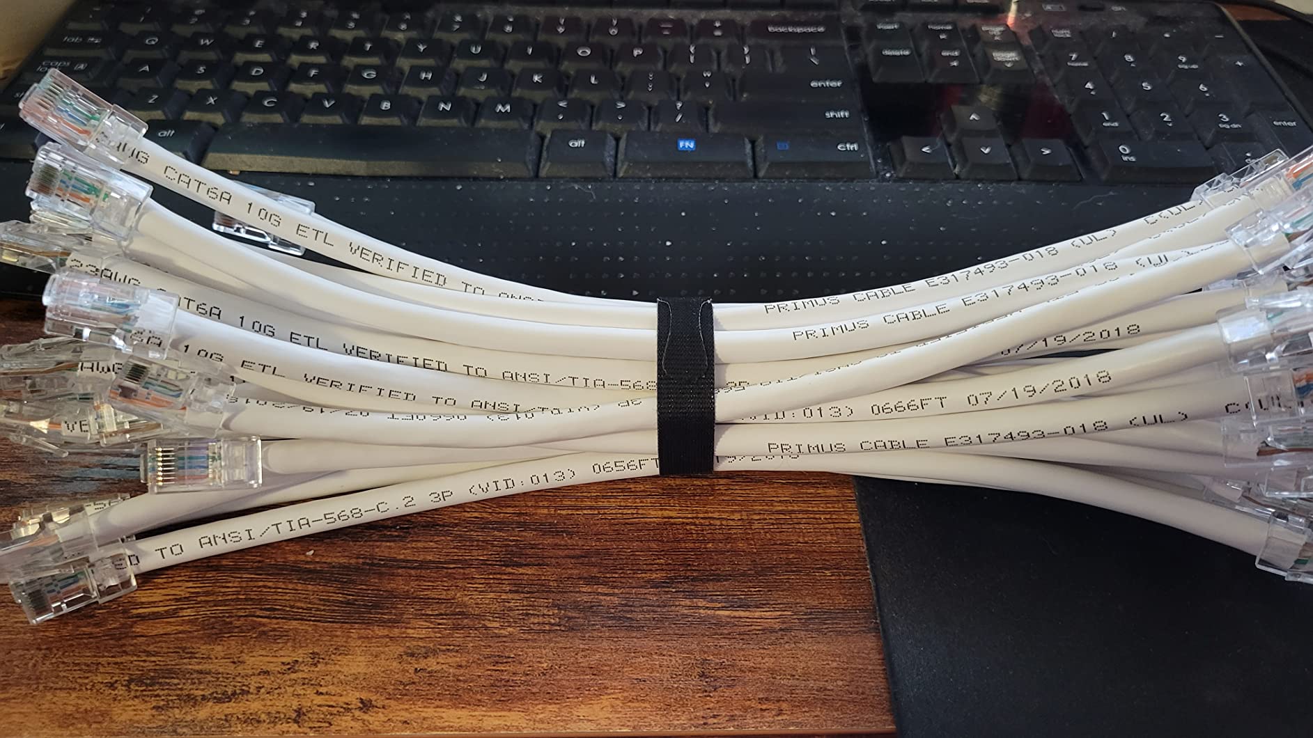 PHAT SATELLITE INTL - Cat6A Riser CMR LAN Network Data Ethernet Patch Cable, Solid Pure Copper 23 AWG, 4-Pair UTP, 550MHz, Pass Thru RJ45 Plug, UL ETL CMR, Assembled in USA (100 feet, White) customer photo 1