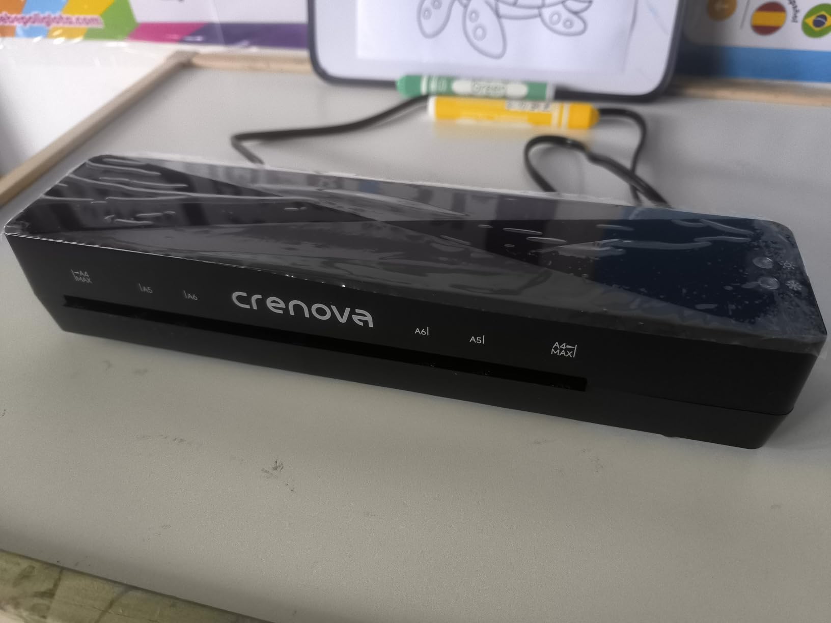 Crenova Laminator Machine with 10 Laminating Sheets, A4 Laminating Machine, Hot & Cold with Fast Warm Technology, Thermal Laminator 9 Inch for Home Office School Business Black customer photo 1