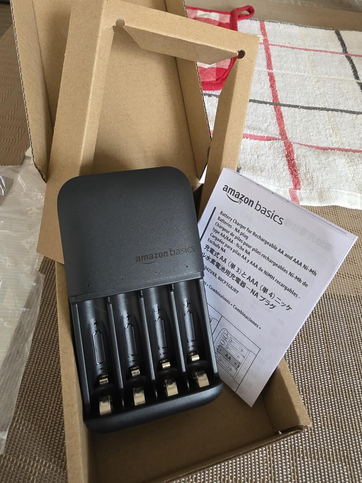 Amazon Basics Smart Battery Charger for Rechargeable AA and AAA NiMh Batteries, 4-Bay, Fast Charging with LED Indicators, Overcharging Protection customer photo 1