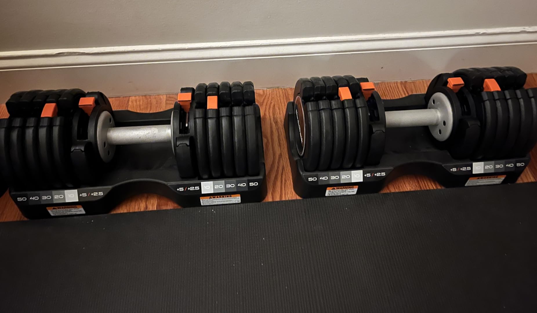 NordicTrack 55 lb Select-a-Weight Dumbbell Pair, Includes 1 Month iFIT Train Membership customer photo 1